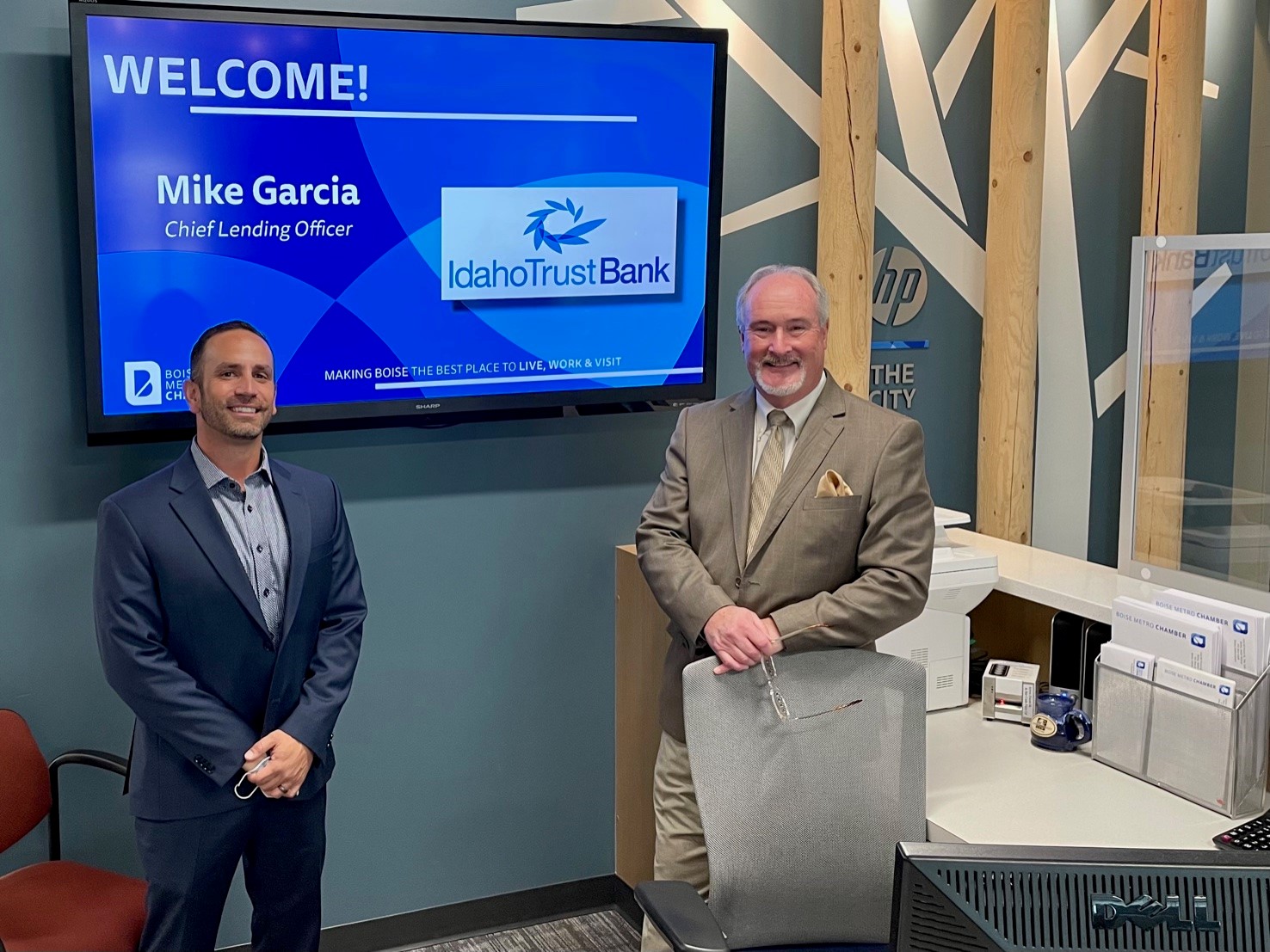 Idaho Trust Bank Chief Lending Officer Mike R. Garcia and Boise Metro Chamber of Commerce CEO and President Bill Connors